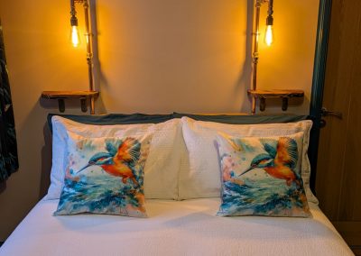 Bed with cushions on