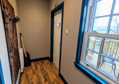 Private entrance hall with bespoke coat hanger and umbrella stand